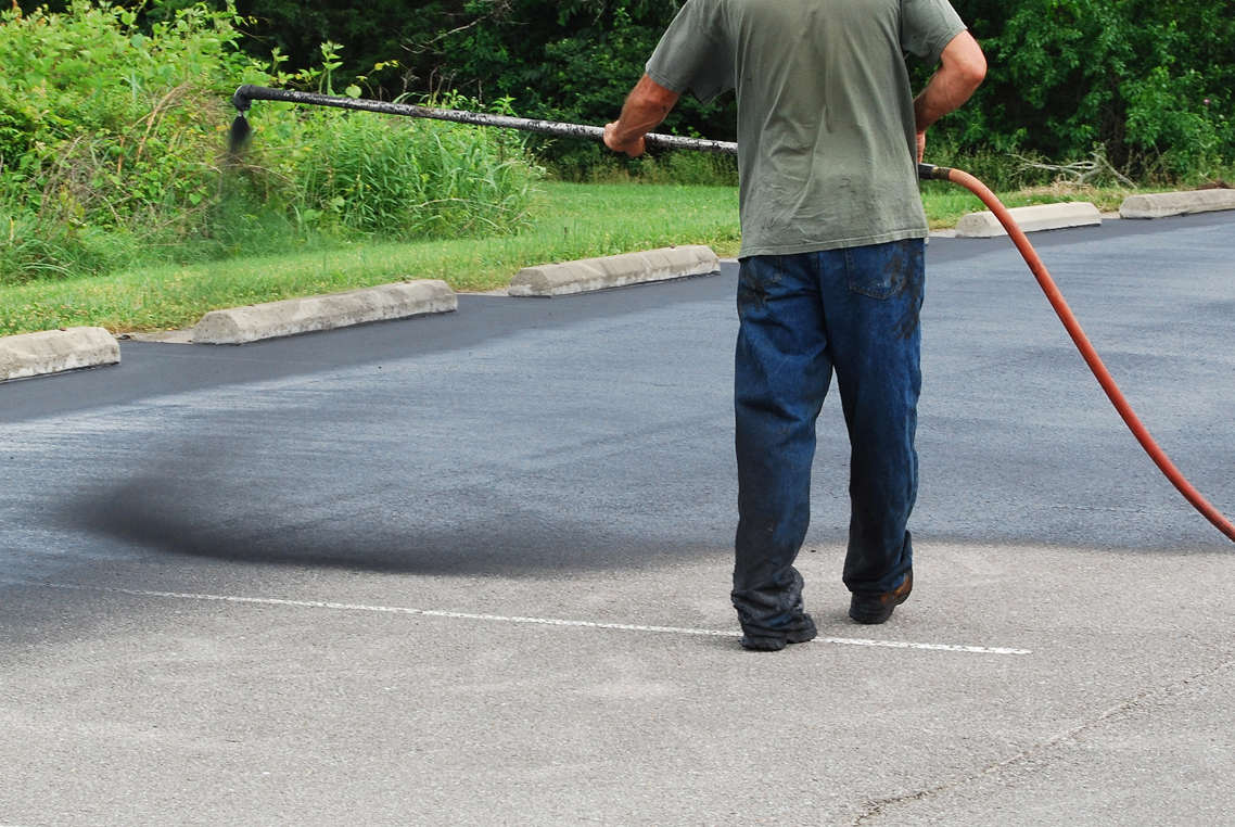 Sealcoating is a protective layer applied to asphalt pavement to shield it from the damaging effects of weather, traffic, UV rays, Oil and other enviromental factors. Regular sealcoating is a cost-effective maintenance practice that can significantly delay the need for major repairs or resurfacing, ultimately saving money over the long term.